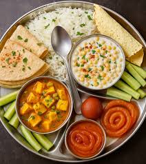 Paneer Methi Malai + Sitafal Sabzi + Samak Rice + Cucumber Raita + Poori + Salad + Papad